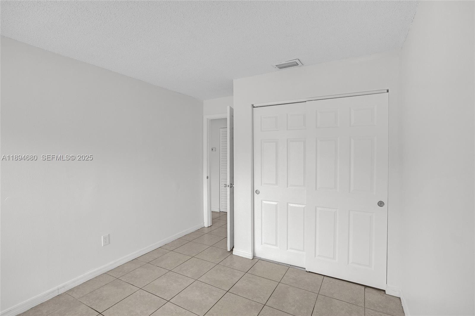 3876 Northwest 207 St Road Miami Gardens, FL 33055 - Photo 24 of 37 a view of an empty room