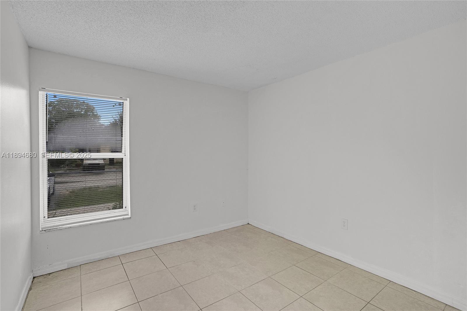 3876 Northwest 207 St Road Miami Gardens, FL 33055 - Photo 26 of 37 a view of empty room