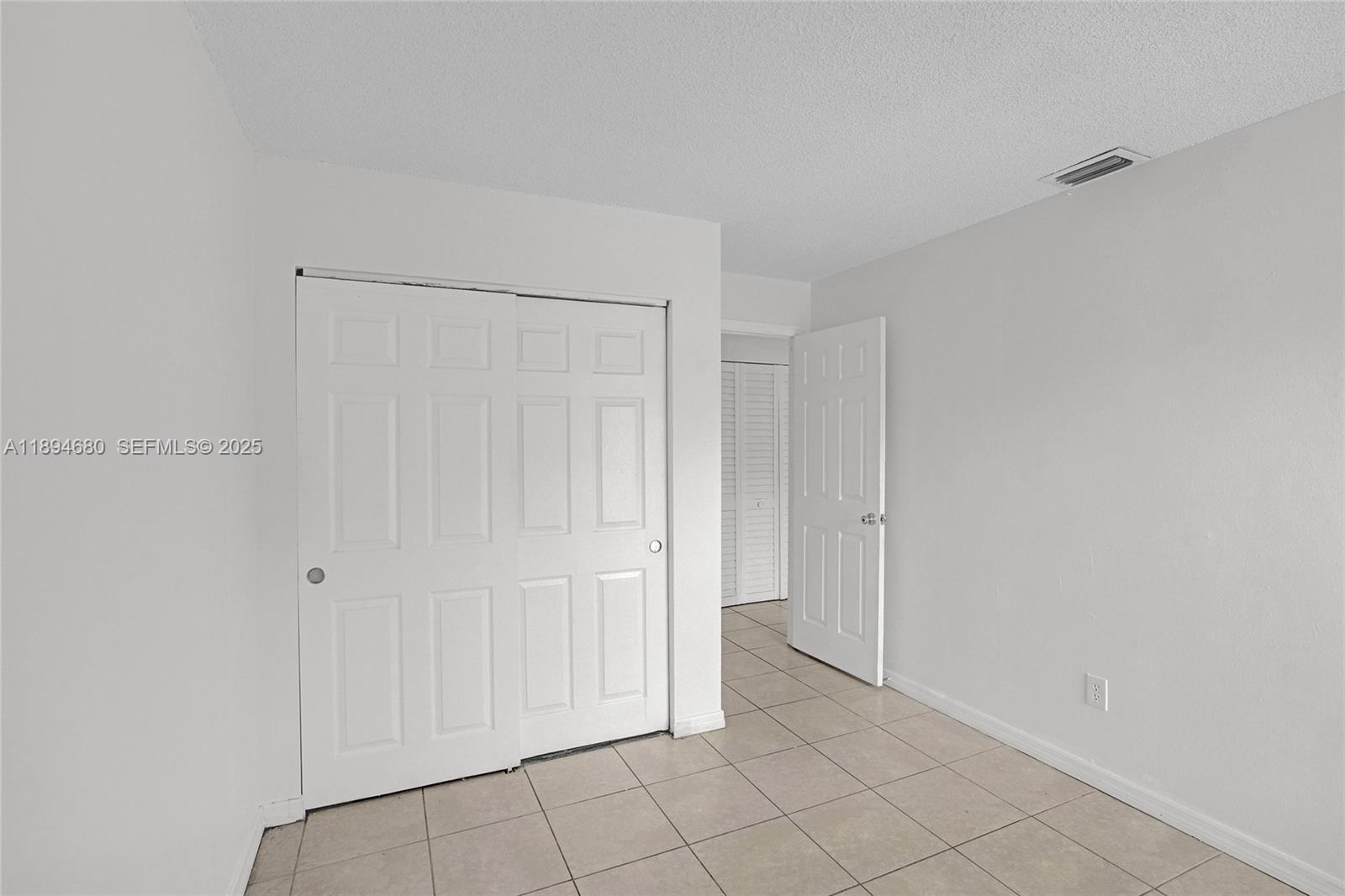 3876 Northwest 207 St Road Miami Gardens, FL 33055 - Photo 28 of 37 a view of an empty room
