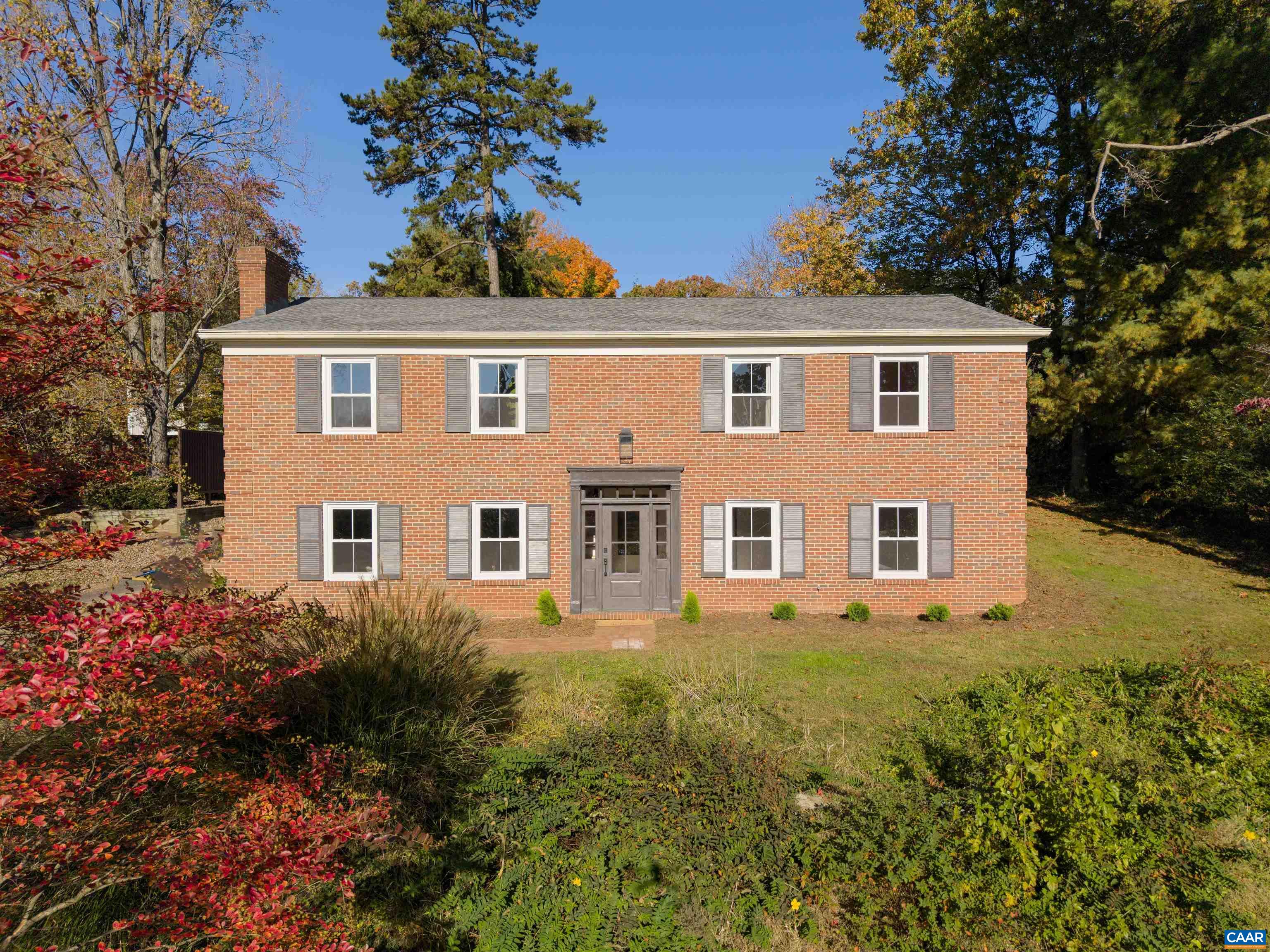 205 Chaucer Road Charlottesville, VA 22901 - Photo 1 of 43 a front view of a house with a yard