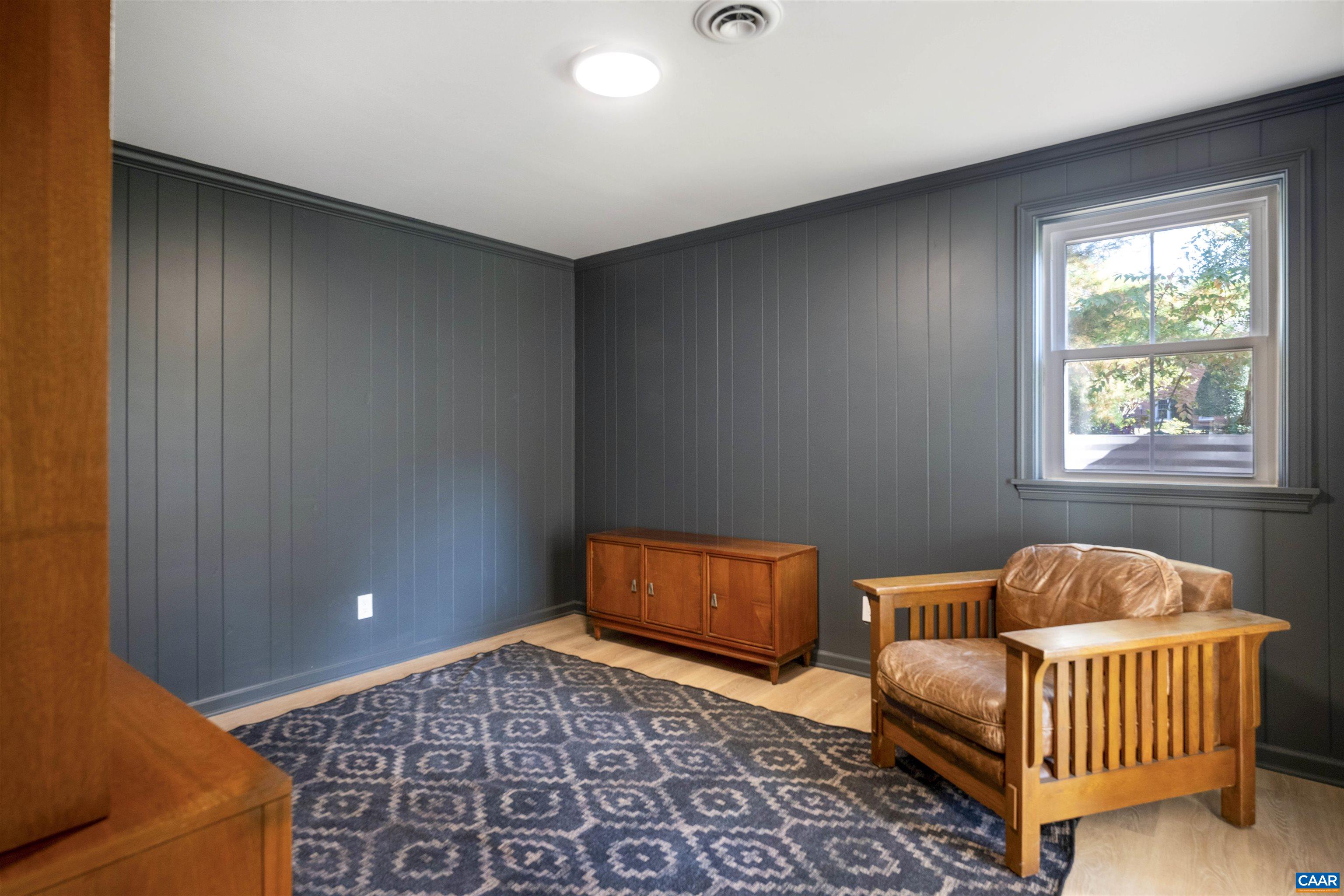 205 Chaucer Road Charlottesville, VA 22901 - Photo 34 of 43 a room with furniture and a window