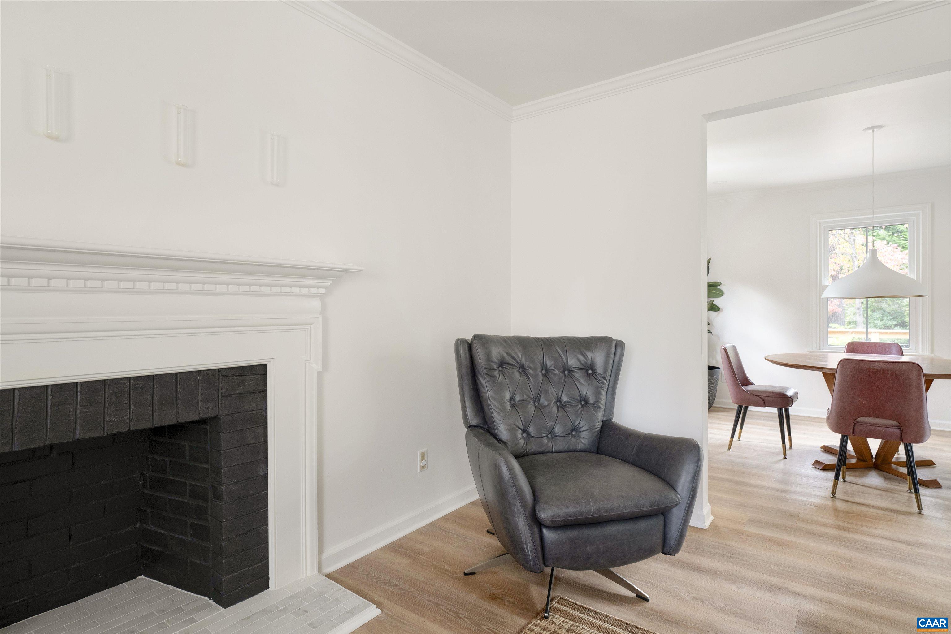 205 Chaucer Road Charlottesville, VA 22901 - Photo 8 of 43 a living room with furniture and a fireplace