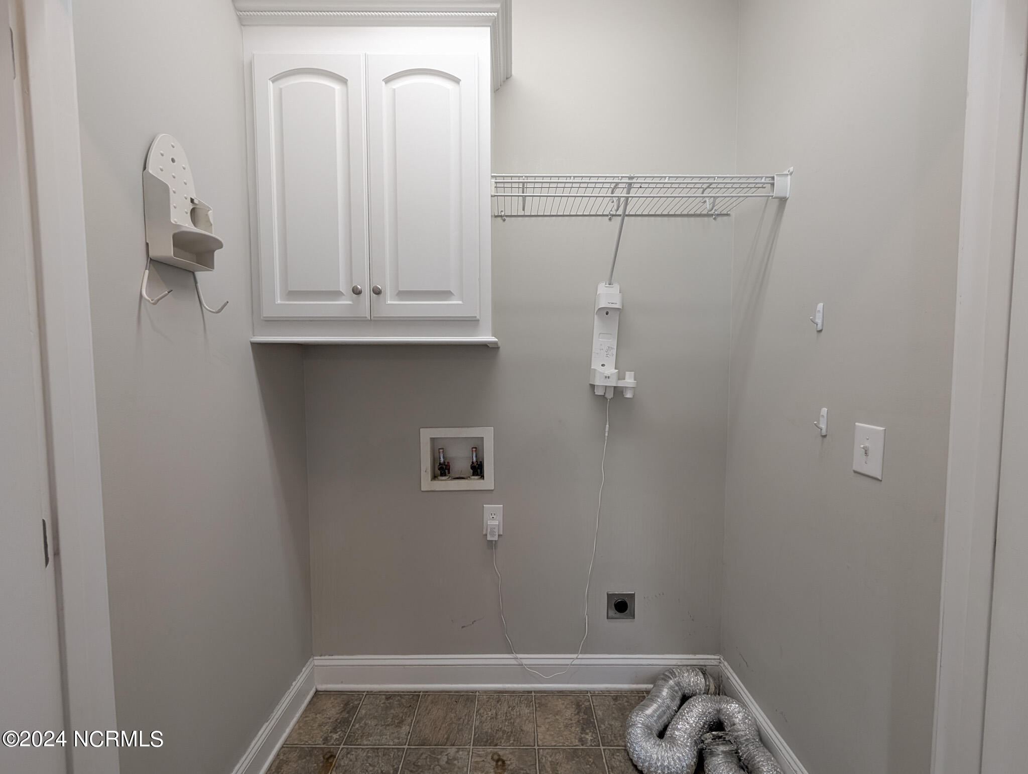 856 Nor-Am Road Pikeville, NC 27863 - Photo 73 of 107 Laundry right inside garage entrance to home