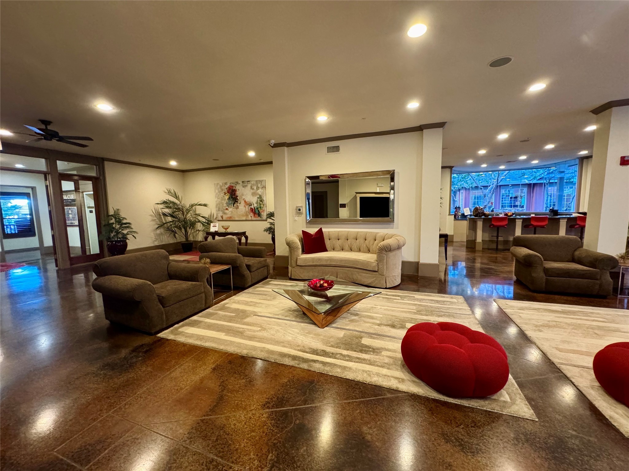 2400 McCue Road, Unit 233 Houston, TX 77056 - Photo 22 of 41 a living room with furniture a flat screen tv and a large window