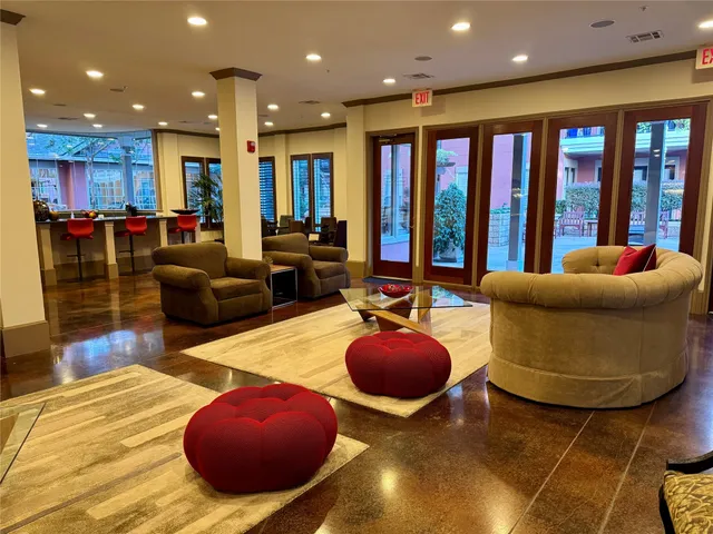 a living room with furniture and a table