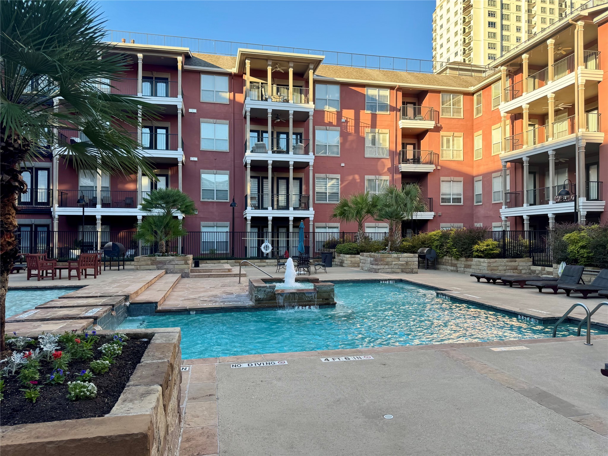 2400 McCue Road, Unit 233 Houston, TX 77056 - Photo 30 of 41 a front view of a building and street view
