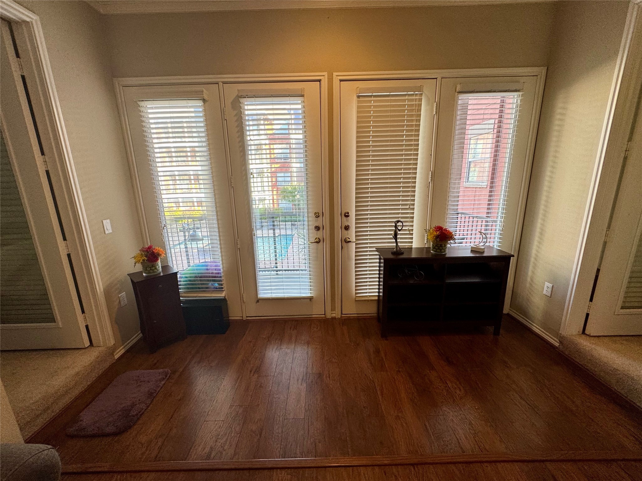 2400 McCue Road, Unit 233 Houston, TX 77056 - Photo 7 of 41 a view of room with window and hardwood floor