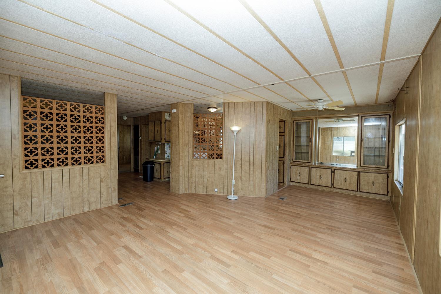2621 Prescott Road, Unit 158 Modesto, CA 95350 - Photo 11 of 35 a view of an empty room with wooden floor