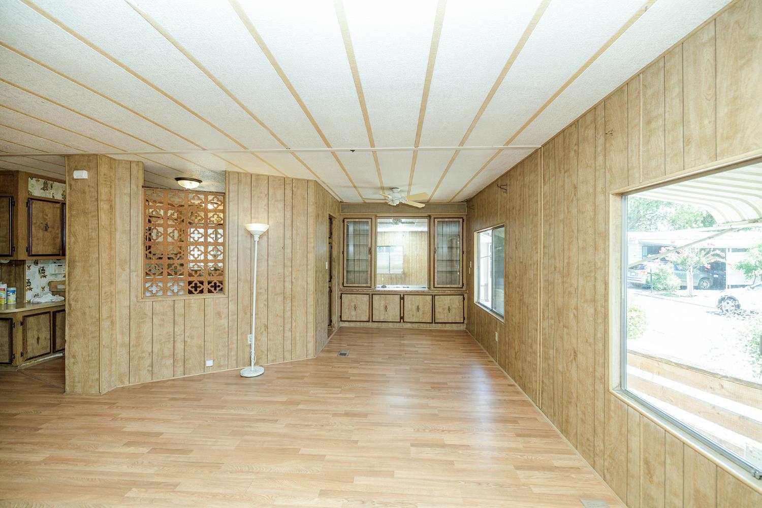 2621 Prescott Road, Unit 158 Modesto, CA 95350 - Photo 13 of 35 a view of a hallway with a glass door