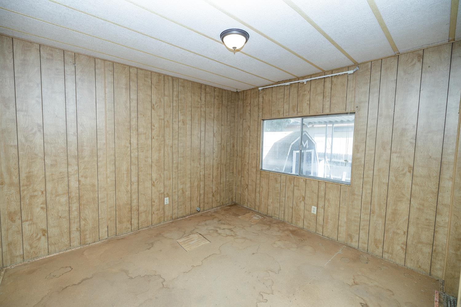 2621 Prescott Road, Unit 158 Modesto, CA 95350 - Photo 21 of 35 a view of an empty room with a window