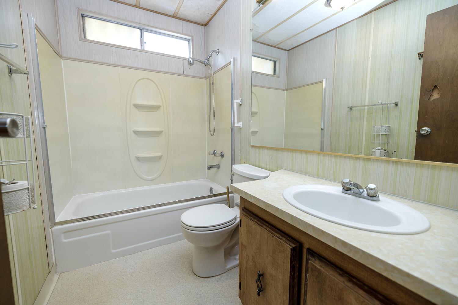 2621 Prescott Road, Unit 158 Modesto, CA 95350 - Photo 23 of 35 a bathroom with a sink a toilet and shower