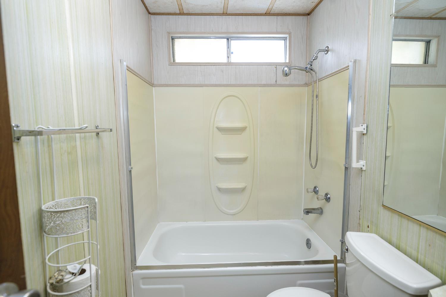 2621 Prescott Road, Unit 158 Modesto, CA 95350 - Photo 24 of 35 a bathroom with a tub and shower