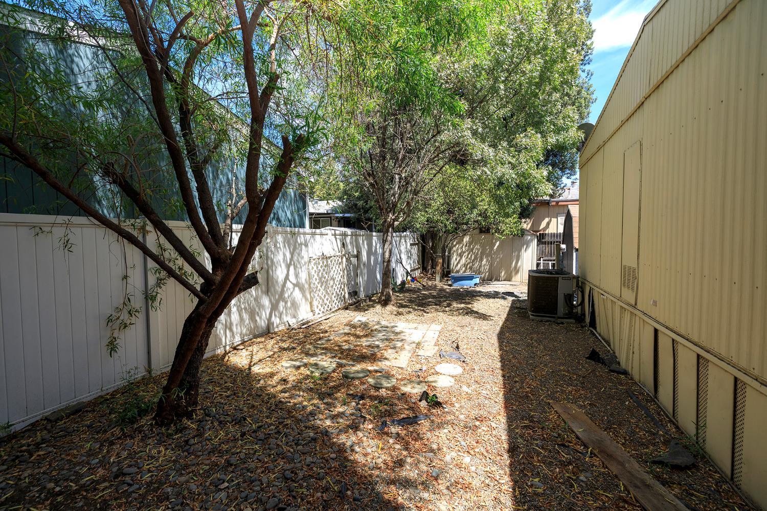2621 Prescott Road, Unit 158 Modesto, CA 95350 - Photo 31 of 35 a view of a yard with trees