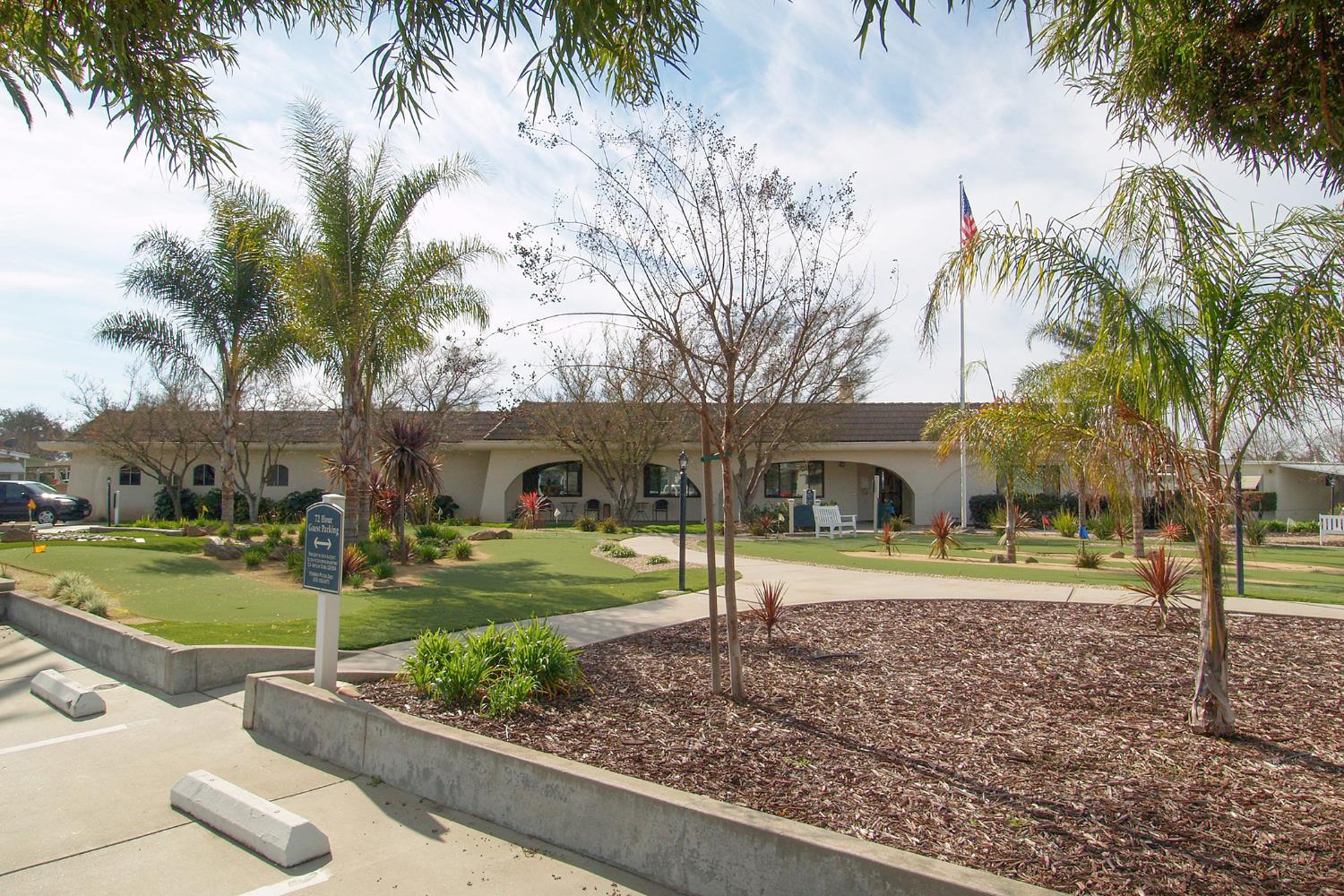 2621 Prescott Road, Unit 158 Modesto, CA 95350 - Photo 33 of 35 a front view of a house with garden