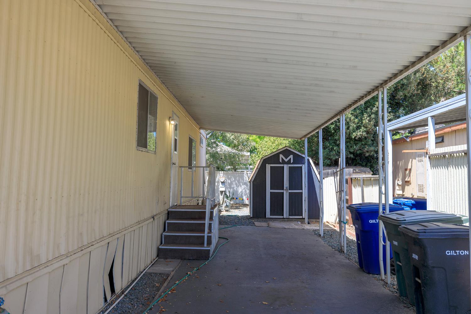 2621 Prescott Road, Unit 158 Modesto, CA 95350 - Photo 4 of 35 a view of a house with backyard and porch