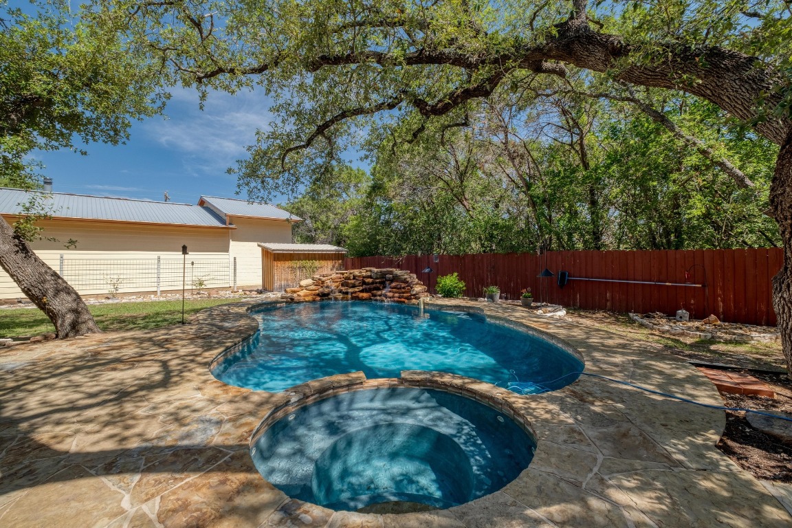 7600 Deer Run Road Leander, TX 78641 - Photo 27 of 39 a view of a backyard with wooden fence
