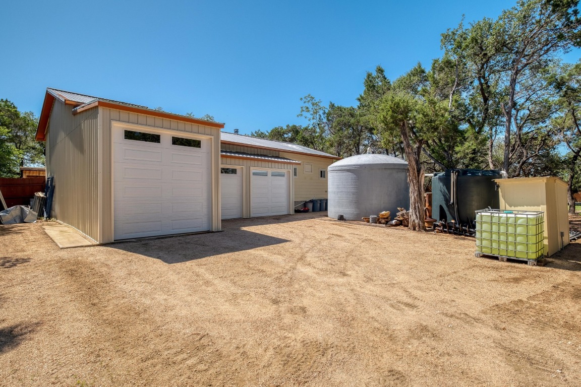 7600 Deer Run Road Leander, TX 78641 - Photo 30 of 39 a view of garage and yard