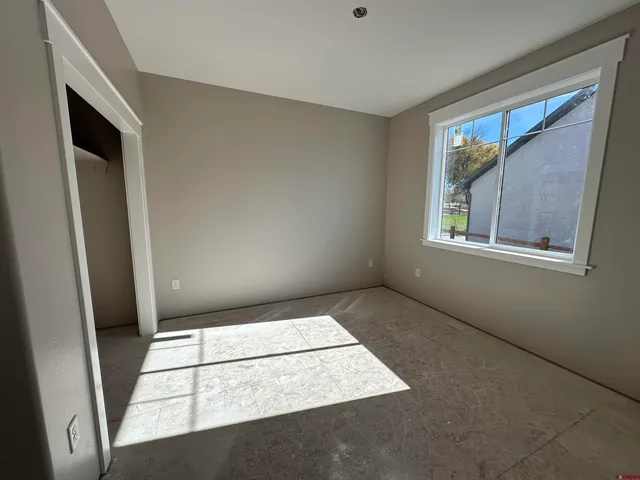 an empty room with windows