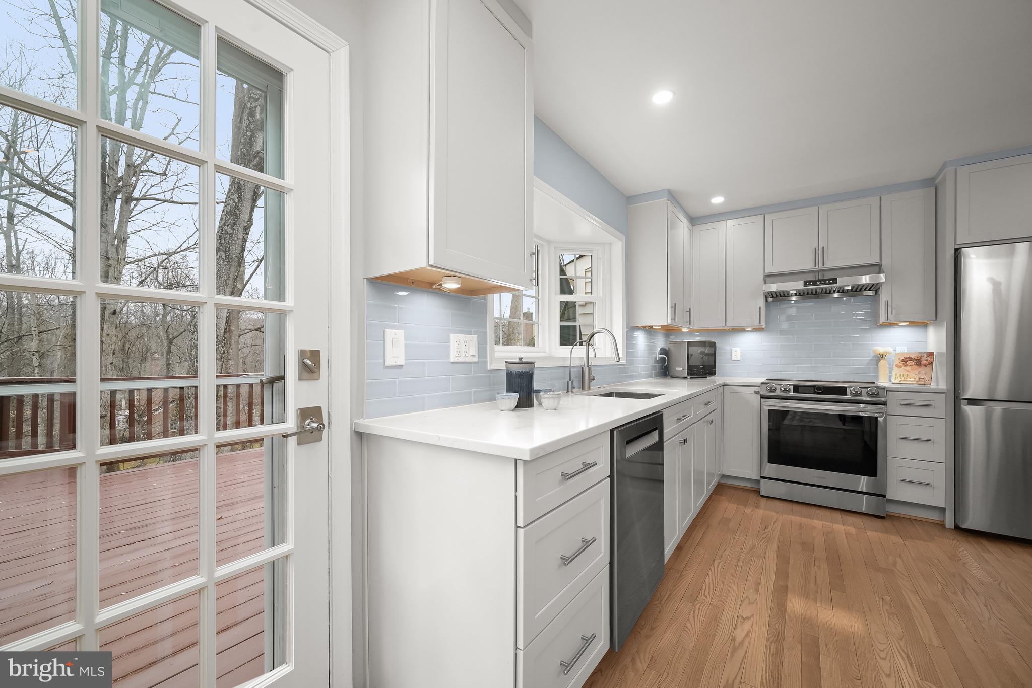 11832 Hunting Ridge Court Potomac, MD 20854 - Photo 12 of 54 The newly remodeled, Island Kitchen