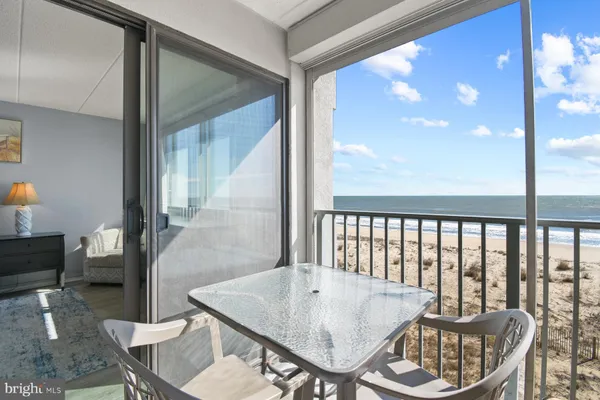 a bedroom with a bed and a mirror