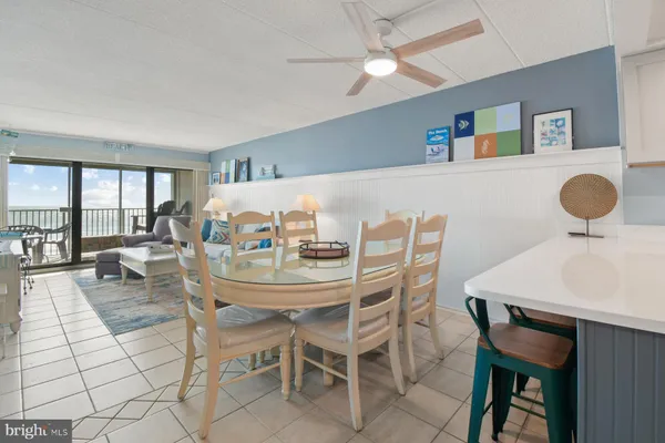 a kitchen with stainless steel appliances a stove a sink a microwave and cabinets