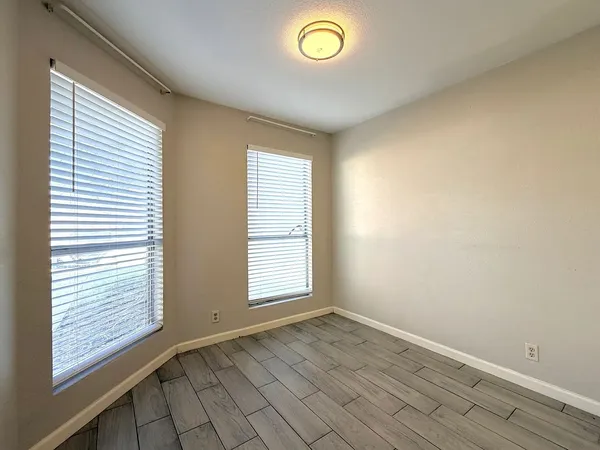 a large kitchen with a stove top oven