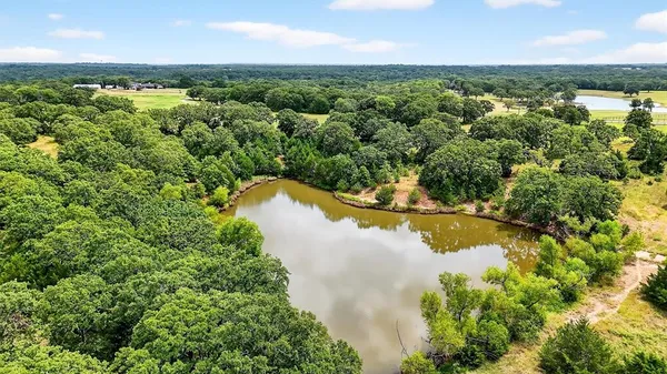 a view of a lake with a city