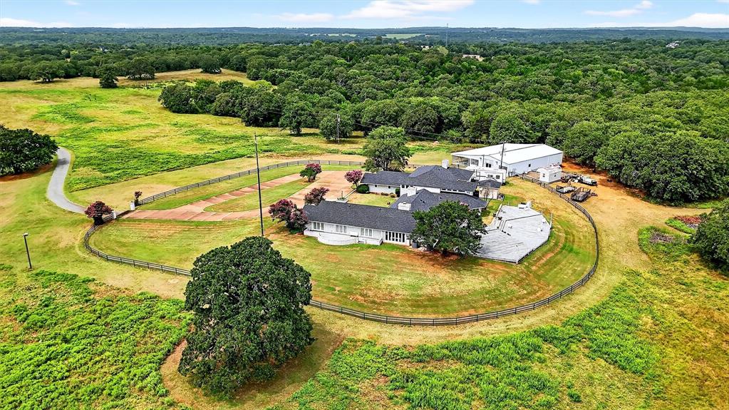 2887 Liberty Road Gordonville, TX 76245 - Photo 20 of 40 a view of a swimming pool with a yard