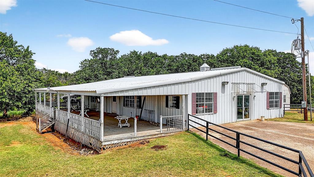 2887 Liberty Road Gordonville, TX 76245 - Photo 26 of 40 a view of a house with pool and chairs