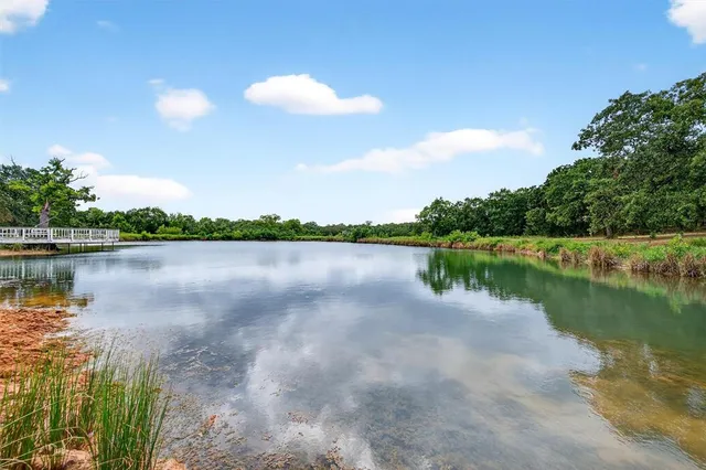 a front view of house with yard and outdoor seating