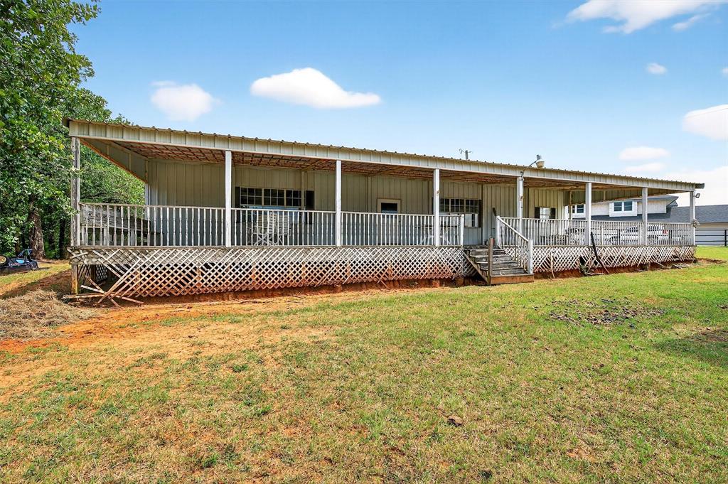 2887 Liberty Road Gordonville, TX 76245 - Photo 38 of 40 a front view of house with yard and outdoor seating