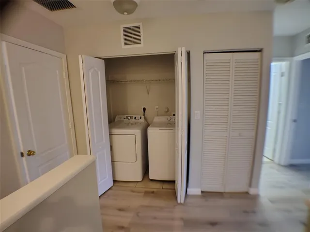 a view of a bathroom with utility room