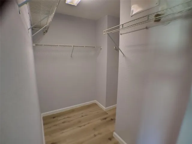 a view of a room with racks on the wall