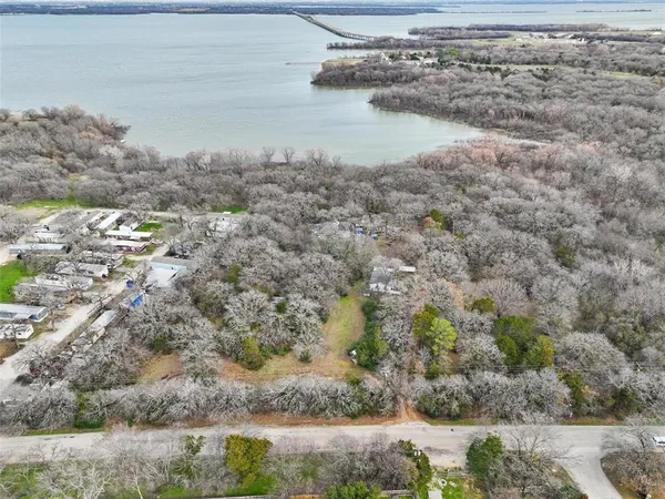 a view of a lake with beach