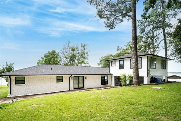 a view of a house with a garage