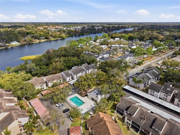 an aerial view of residential houses with outdoor space