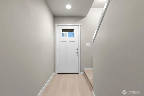 a view of livingroom with window and hardwood floor
