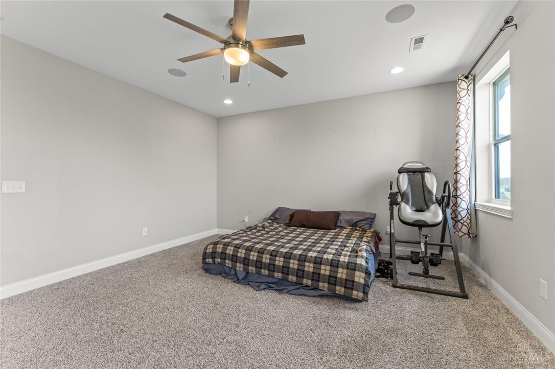 2425 Middleboro Road Clarksville, OH 45113 - Photo 63 of 91 This spacious bedroom offers ample comfort and natural light.