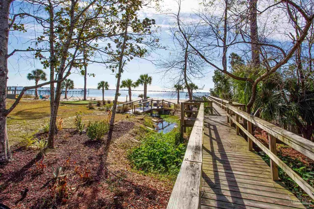 a view of a yard with sitting area