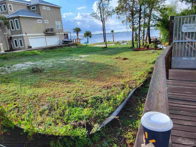 a view of a backyard with a garden