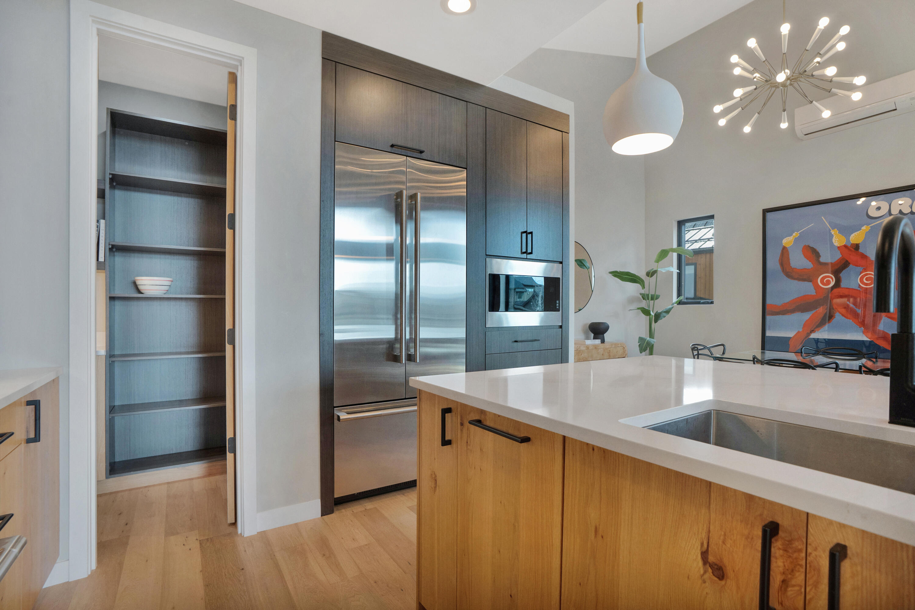61250 Meeks Trail Bend, OR 97702 - Photo 20 of 43 a kitchen with stainless steel appliances granite countertop a refrigerator and a sink