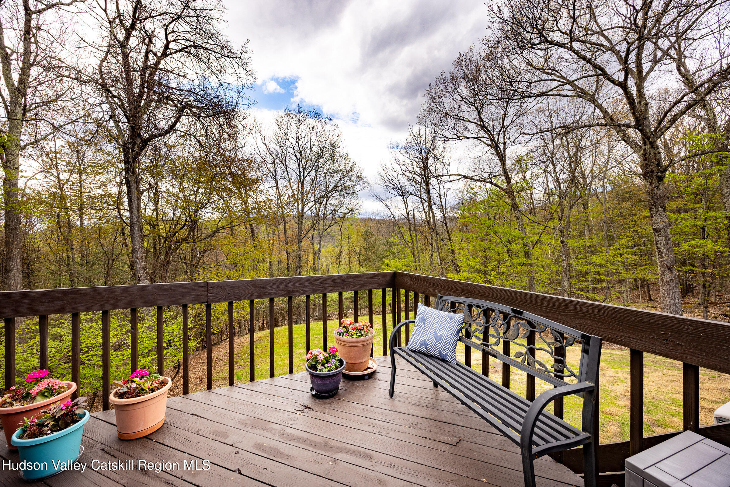 170 Macdaniel Road Woodstock, NY 12498 - Photo 11 of 31 a view of wooden deck with furniture and trees