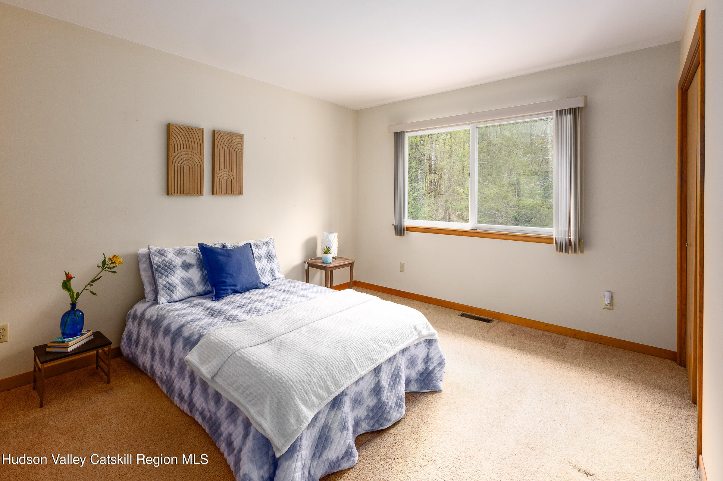 170 Macdaniel Road Woodstock, NY 12498 - Photo 14 of 31 a bedroom with bed and a window