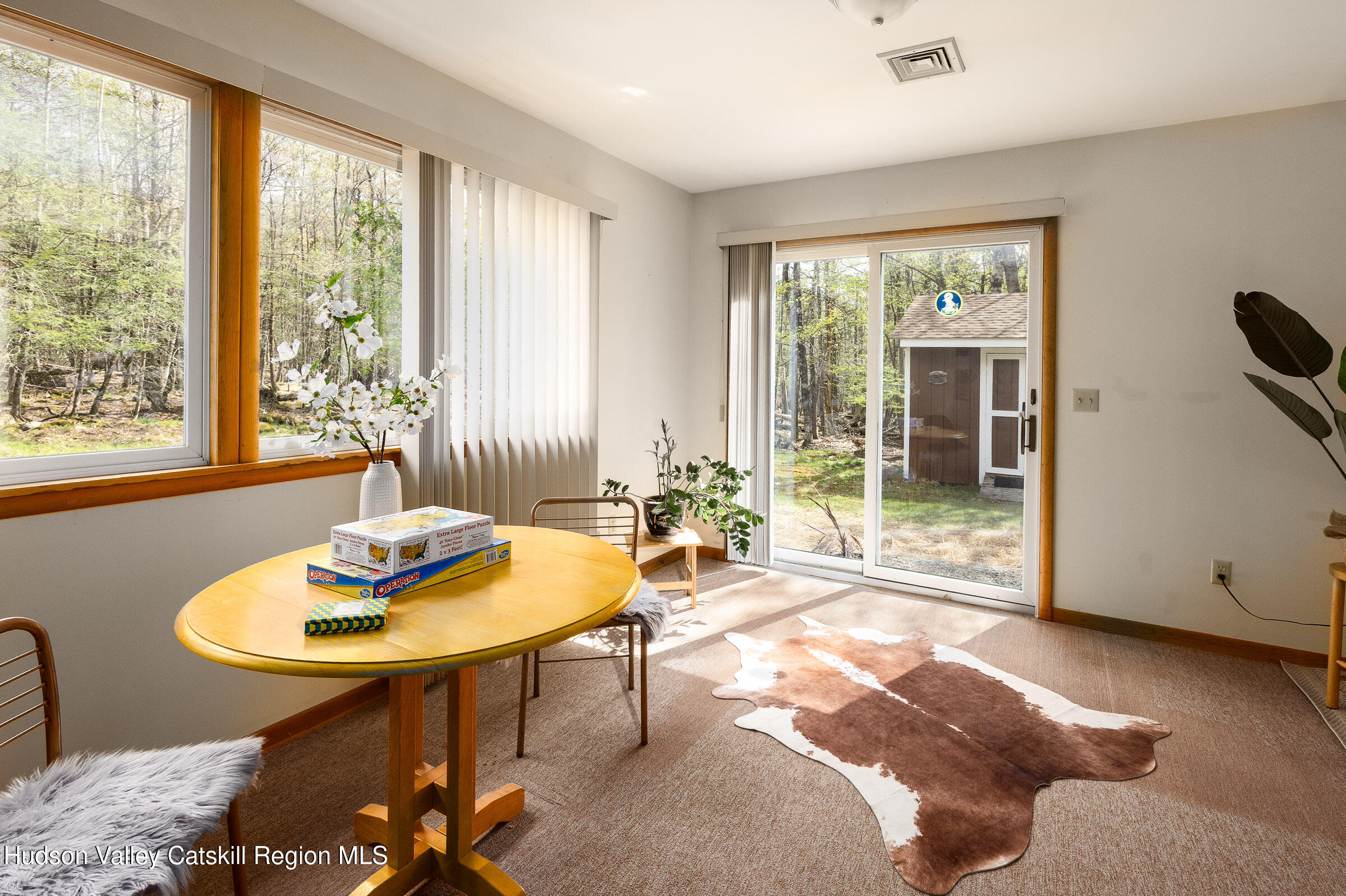 170 Macdaniel Road Woodstock, NY 12498 - Photo 18 of 31 a living room with furniture and a window