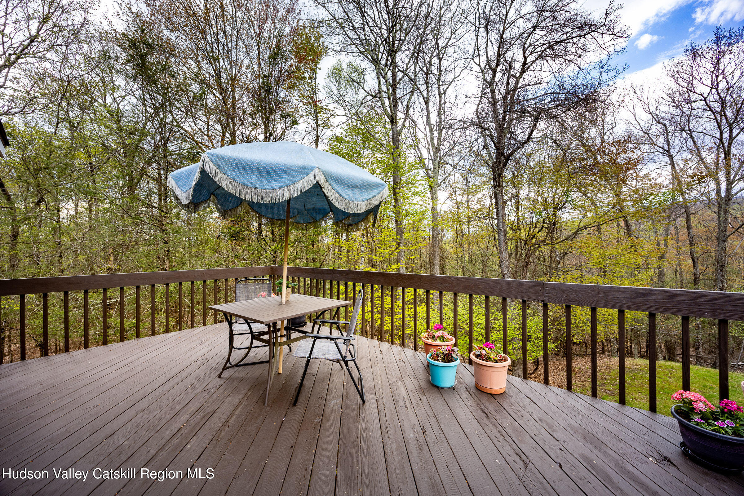 170 Macdaniel Road Woodstock, NY 12498 - Photo 10 of 31 a view of a table and chairs on the roof deck