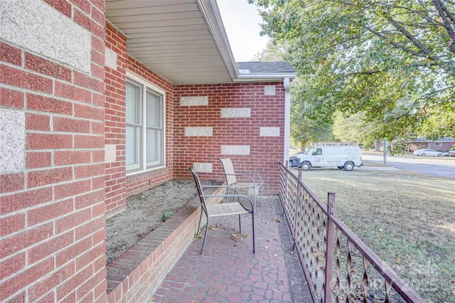 a view of a balcony with a patio