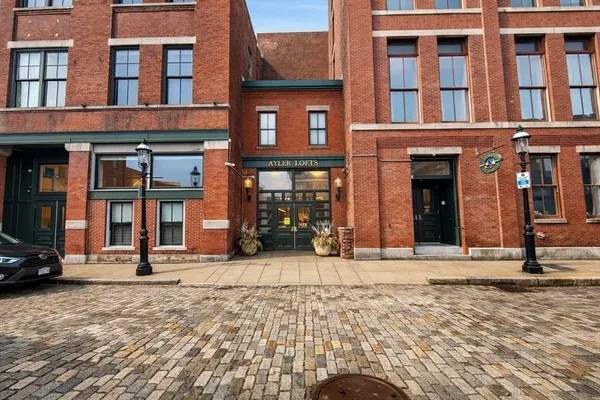 a car parked in front of a building