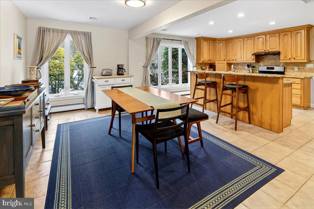 14 Baldwin Street Pennington, NJ 08534 - Photo 17 of 42 a view of a dining room with furniture window and wooden floor