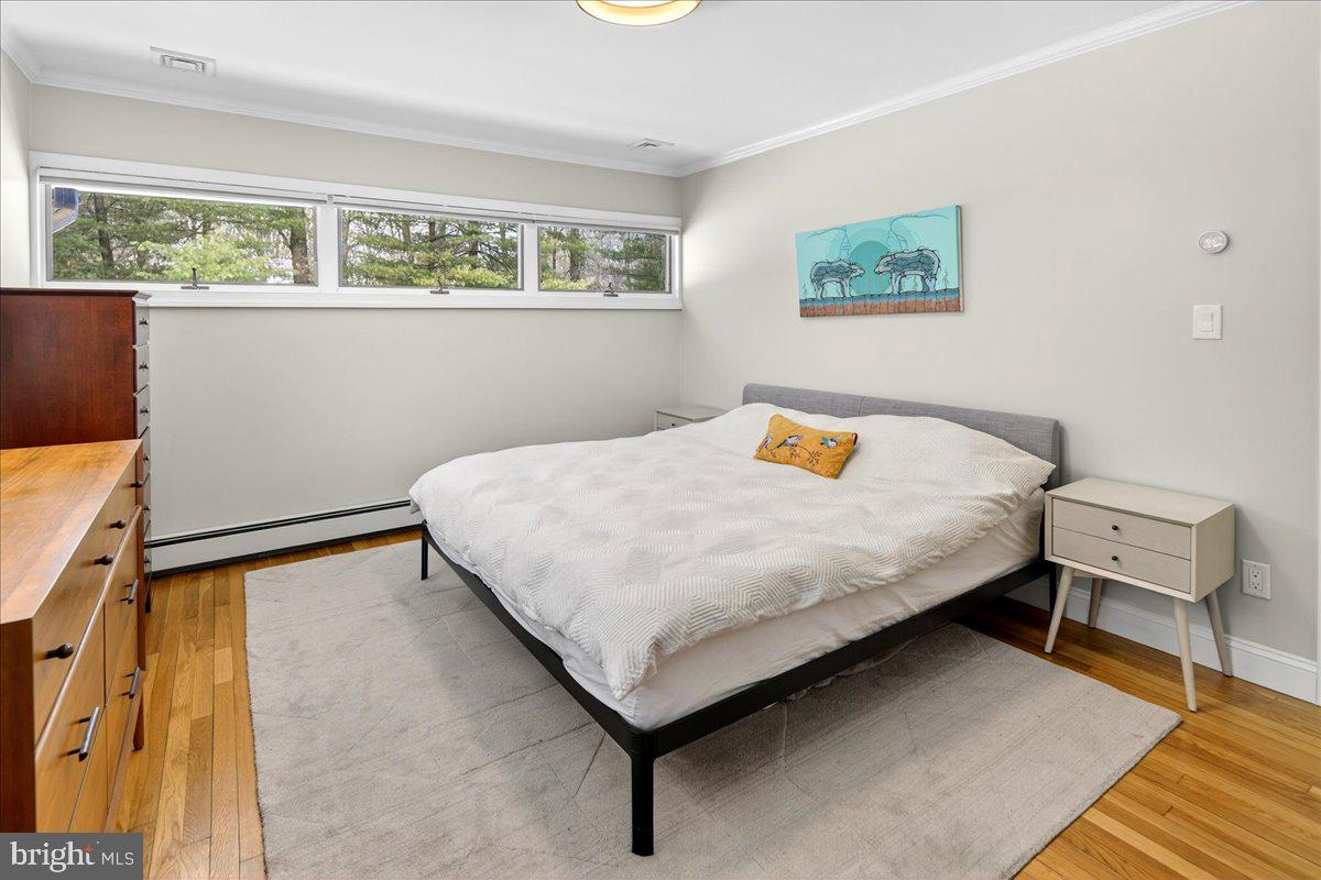 14 Baldwin Street Pennington, NJ 08534 - Photo 26 of 42 a bedroom with a bed and window