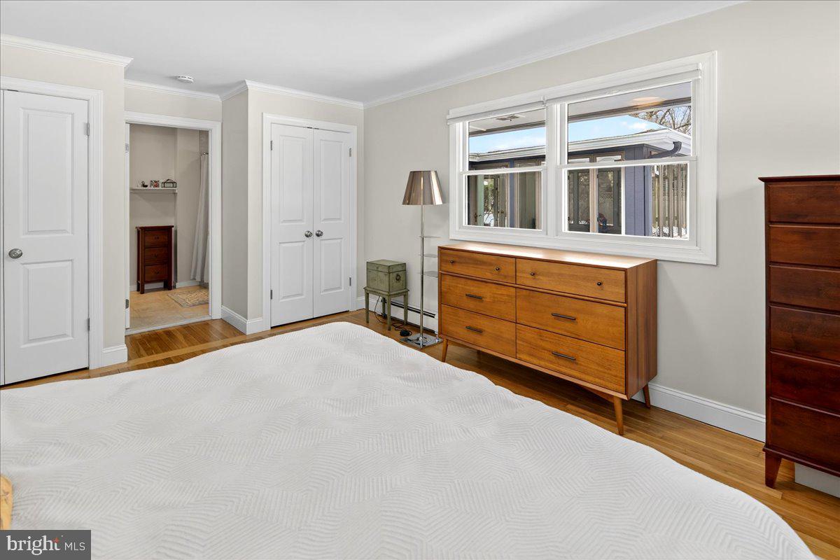 14 Baldwin Street Pennington, NJ 08534 - Photo 27 of 42 a bed room with a dresser and a window